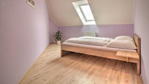 Postel nebo postele na pokoji v ubytování Boromeum Residence