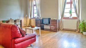 TV a/nebo společenská místnost v ubytování Boromeum Residence