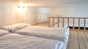 Postel nebo postele na pokoji v ubytování Boromeum Residence