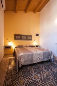Säng eller sängar i ett rum på Sicilia Ovest - Sea View Terrace Dolce Vita