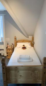 Ένα ή περισσότερα κρεβάτια σε δωμάτιο στο Ardvaich House
