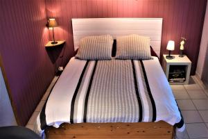 Postel nebo postele na pokoji v ubytování Chambre d'hôtes de Thorée