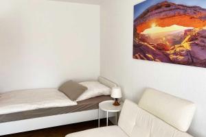 Postel nebo postele na pokoji v ubytování 1 Zimmer Apartment mit Balkon