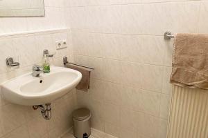 Koupelna v ubytování 1 Zimmer Apartment mit Balkon