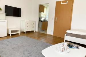 Postel nebo postele na pokoji v ubytování 1 Zimmer Apartment mit Balkon