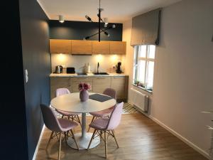 Kuchyňa alebo kuchynka v ubytovaní Apartament „Blue Forest”