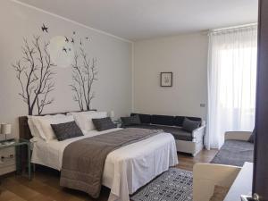 Postel nebo postele na pokoji v ubytování Hotel Funivia