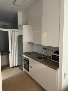 Kuchyň nebo kuchyňský kout v ubytování Apartamento Tarifa