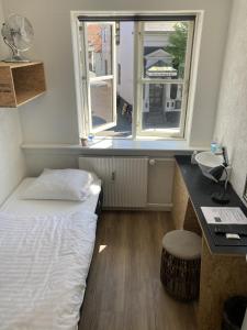 Postel nebo postele na pokoji v ubytování Hotel Sniva