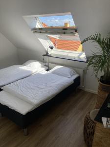 Postel nebo postele na pokoji v ubytování Hotel Sniva