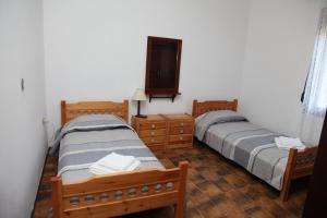 Posteľ alebo postele v izbe v ubytovaní Hellenick House