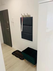 Televízia a/alebo spoločenská miestnosť v ubytovaní Apartament Walczaka 15 MIEJSCE PARKINGOWE
