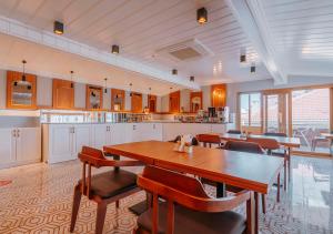 a dining room with a table and some chairs at TS Park Hotel in Trabzon