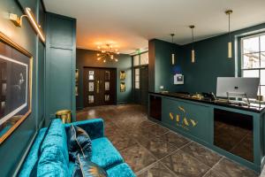 TV a/nebo společenská místnost v ubytování Stay Hotel