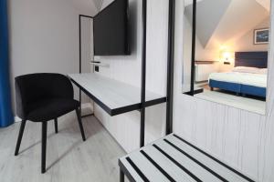 Cama ou camas em um quarto em Willa Nova