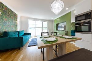 Kuchyňa alebo kuchynka v ubytovaní Apartament Nowy Świat Centrum