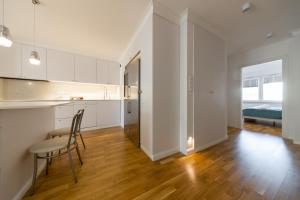 Posteľ alebo postele v izbe v ubytovaní Apartament Nowy Świat Centrum