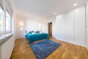 Posteľ alebo postele v izbe v ubytovaní Apartament Nowy Świat Centrum