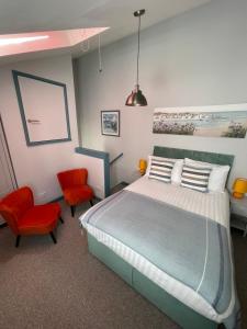 Uma cama ou camas num quarto em Harbour View