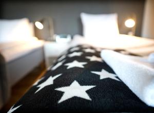 Letto o letti in una camera di Port Hotel