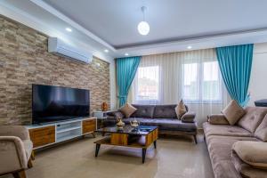 Μια τηλεόραση ή/και κέντρο ψυχαγωγίας στο Infinity Lily Villa 1