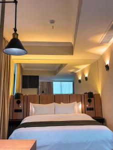 Katil atau katil-katil dalam bilik di Genesis Kosher Hotel Tbilisi