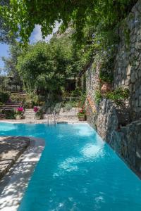 Bazén v ubytovaní Amore Rentals - Villa Era alebo v jeho blízkosti