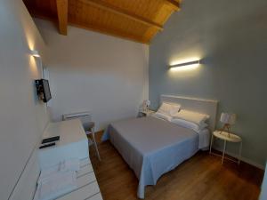 Posteľ alebo postele v izbe v ubytovaní Casa Fadda