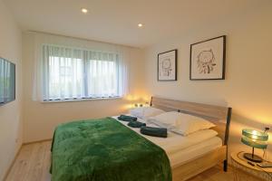 Posteľ alebo postele v izbe v ubytovaní Apartament Na Borach I SPA