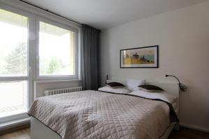 Posteľ alebo postele v izbe v ubytovaní Apartmán Valérie, byt Valtice