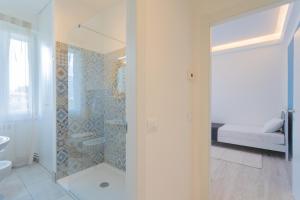 Koupelna v ubytování Acqua Chiara Apartment by Rent All Como