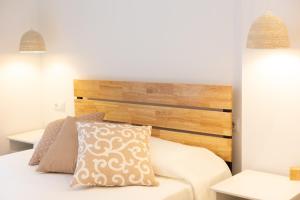 Apartaments Voralmar客房内的一张或多张床位