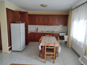 Kuchyň nebo kuchyňský kout v ubytování Villa Natali