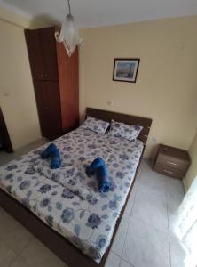 Postel nebo postele na pokoji v ubytování Villa Natali