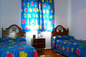 Łóżko lub łóżka w pokoju w obiekcie Chalet Pilahito