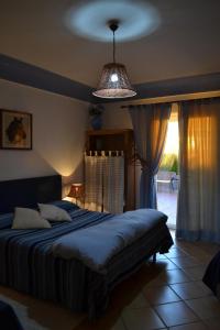 Кровать или кровати в номере B&B The Sunset