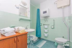 Koupelna v ubytování Apartmani Bego + 30 fotografií