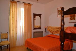 A bed or beds in a room at Hotel Roma