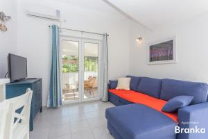 TV a/nebo společenská místnost v ubytování Apartmani Bego