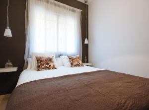Posteľ alebo postele v izbe v ubytovaní Sol Suite Apartment with Garden