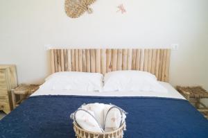 Posteľ alebo postele v izbe v ubytovaní Casa vacanza a 10 metri dal mare