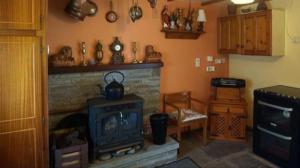 Kuchyň nebo kuchyňský kout v ubytování The Cosy Barn