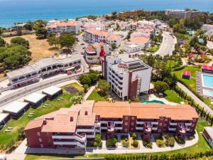 an overhead view of a city with buildings and the ocean at Topazio Vibe Beach Hotel & Apartments - Adults Friendly in Albufeira
