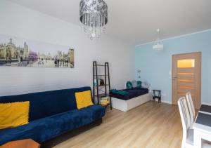 Posedenie v ubytovaní Błękitny Apartament