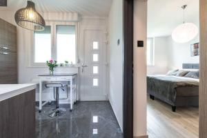 Postel nebo postele na pokoji v ubytování Apartman Leda