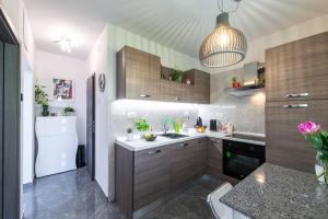 Η κουζίνα ή μικρή κουζίνα στο Apartman Leda