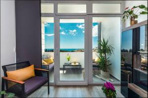 Μια τηλεόραση ή/και κέντρο ψυχαγωγίας στο Apartman Leda