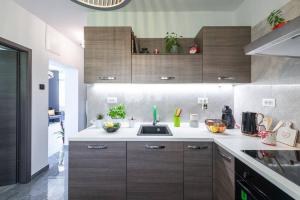 Kuchyň nebo kuchyňský kout v ubytování Apartman Leda