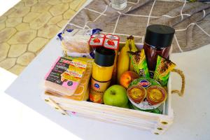 a drawer filled with food on a table at Charikleia's studio in Káto Lekhónia