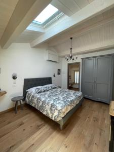 A bed or beds in a room at AFFITTACAMERE LA VOLPE